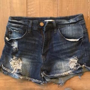 Distressed denim shorts